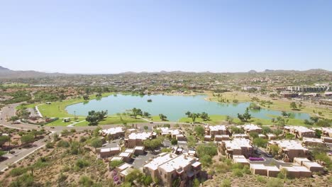 Aerial-approach-of-the-world-famous-Fountain-Hills-Fountain,-Fountain-Hills,-Arizona