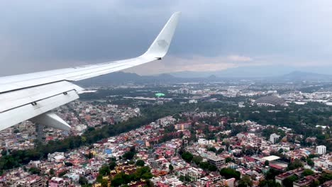 shot-from-the-plane-window-during-landing-in-mexico-city-seeing-the-sports-palace
