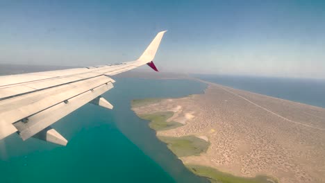 shot-from-airplane-window-during-landing-in-los-cabos-mexico
