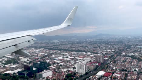 shot-from-the-plane-window-during-landing-in-mexico-city-during-a-storm
