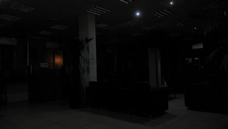 Turning-off-and-on-light-in-empty-office-at-modern-business-center