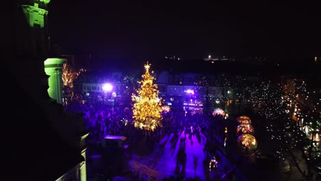 Magical-Christmas-town-of-Kaunas-city,-aerial-drone-view