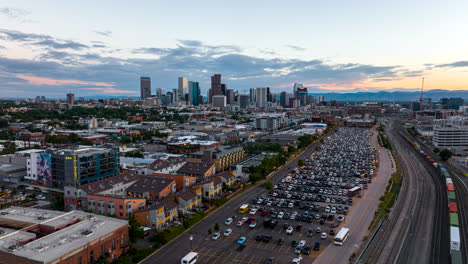 Aerial-Timelapse-of-Rockies-Parking-Lot-in-Denver,-Colorado-at-Sunset