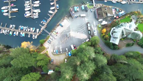Overhead-Shot-of-Motorboats-,-Yachts-and-Sailboats-mooring-at-deep-cove-marina-on-the-Indian-Arm-in-Deep-Cove-North-Vancouver