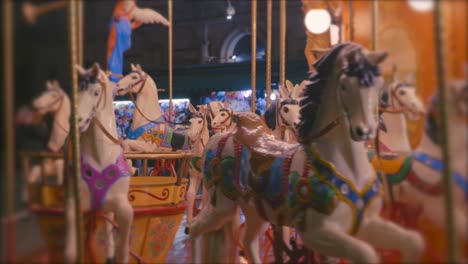 A-colourful-Carousel-with-lights-and-horses-on-a-evening