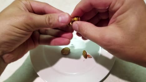 Shelling-and-eating-pistachios