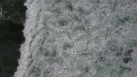 Aerial:-Waves-breaking-from-top-down-angle