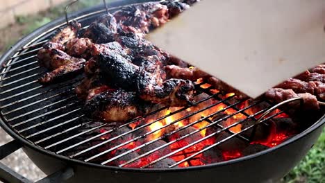 Cooking-Meat-on-a-Charcoal-Barbecue