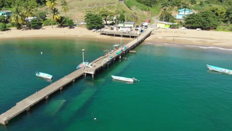 Sting-rays-live-under-this-jetty-in-the-fishing-village-laid-back-lifestyle-of-fishing-for-a-living-in-Parlatuvier,-Tobago