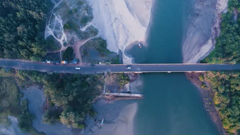 Aerial-view-of-seaside-bridge-and-vehicles