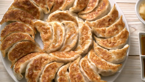 fried-gyoza-or-dumplings-snack-with-soy-sauce-in-Japanese-style