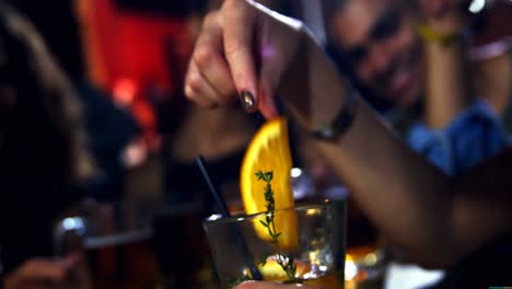 Woman-having-fun-while-drinking-cocktail
