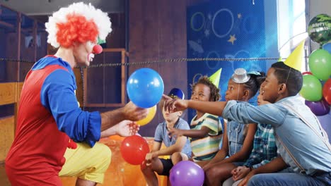 Clown-playing-with-the-kids-during-birthday-party-4k