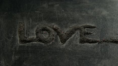 Love-word-arranged-on-concrete-background-4k