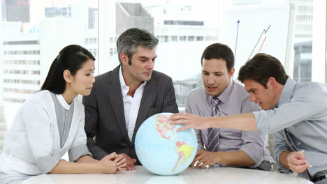 Multiethnic-business-team-talking-about-globalization