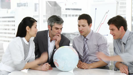 Several-business-people-talking-about-globalization