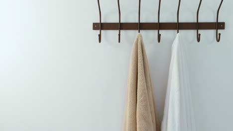 Towels-hanging-on-hook-4k