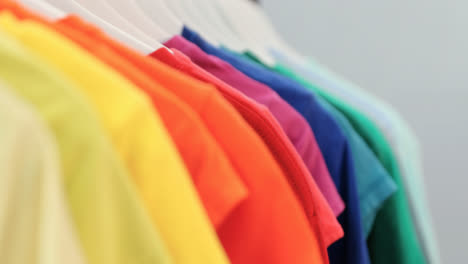Various-t-shirts-arranged-in-a-row-on-cloth-rack-4k
