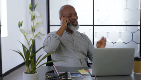 Businessman-talking-on-phone-on-desk-4k