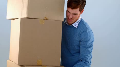 Courier-man-picking-up-cardboard-boxes-4k