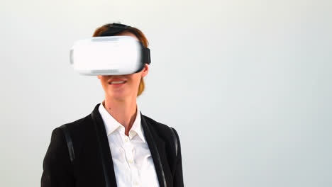 Business-woman-using-virtual-reality-headset-and-digital-tablet-4k