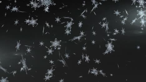 Snowflakes-falling-against-black-background