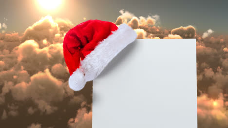 Weihnachtsmütze-Mit-Weißer-Karte-Und-Wolken
