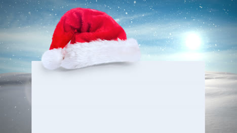 Weihnachtsmütze-Mit-Weißer-Karte-Und-Winterlandschaft