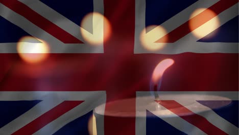 British-flag-with-candle-going-out