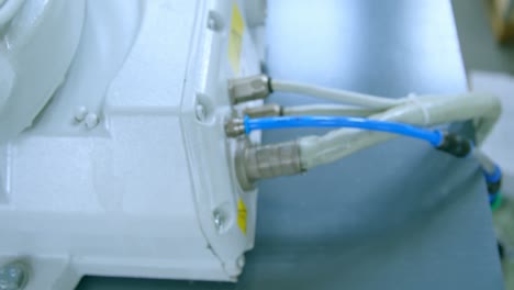 Electric-wire-and-air-hose-connected-at-control-box-of-robot-4k