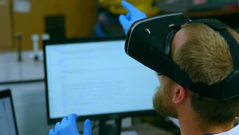 Robotic-engineer-using-virtual-reality-headset-at-desk-4k