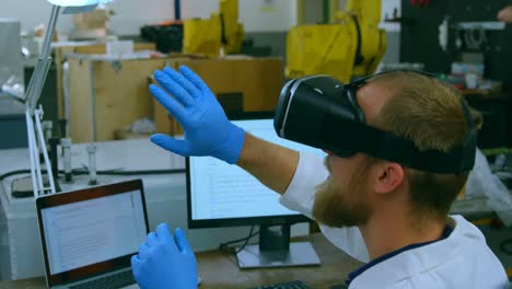 Robotic-engineer-using-virtual-reality-headset-at-desk-4k