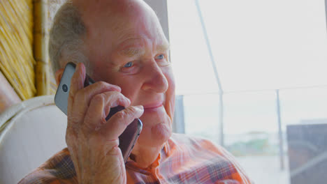 Close-up-of-Caucasian-senior-man-talking-on-mobile-phone-4k