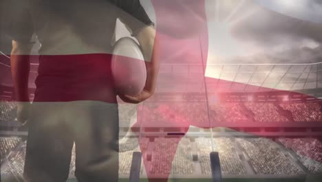 Englischer-Rugbyspieler-Blickt-Auf-Das-Stadion-Mit-Einer-Englischen-Flagge-Im-Vordergrund