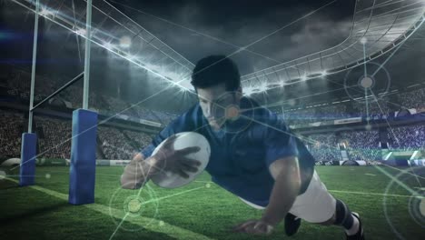 Rugby-player-diving-to-score-in-a-big-stadium-with-light-connections-on-the-foreground