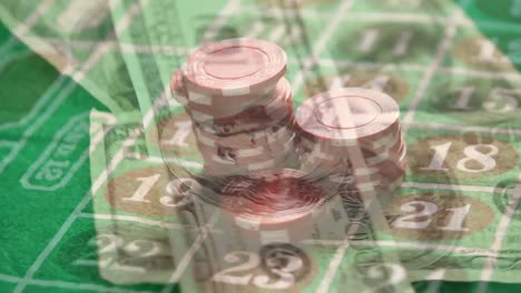 Gambling-chips-placed-on-a-roulette-grid-with-banknotes-in-the-foreground