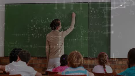 Teacher-writing-on-chalkboard-4k