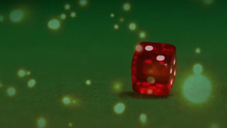 Red-dice-falling-down-on-green-table