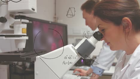Scientist-studying-on-a-microscope