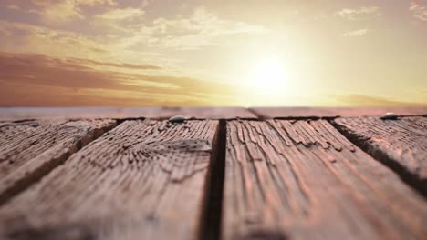 Wooden-deck-with-a-view-of-a-sunset
