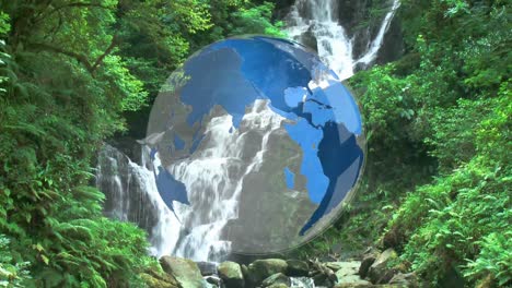 Rotating-globe-in-front-of-water-falls
