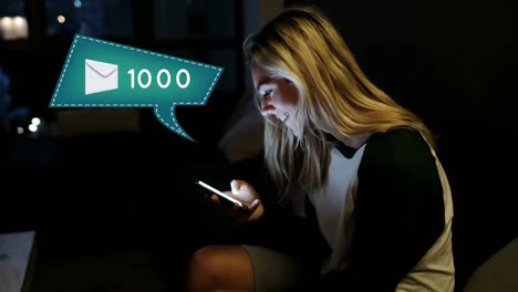 Woman-texting-in-a-dark-room
