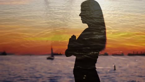 Silhouette-of-a-woman-beside-an-ocean