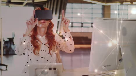 Frau-Trägt-Ein-Virtual-Reality-Headset-Und-Tippt-In-Die-Luft
