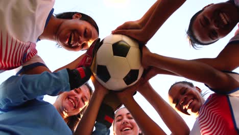 Low-angle-view-of-diverse-female-soccer-team-4k