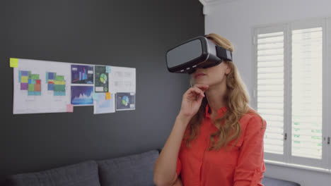 Female-executive-using-virtual-reality-headset-in-a-modern-office-4k