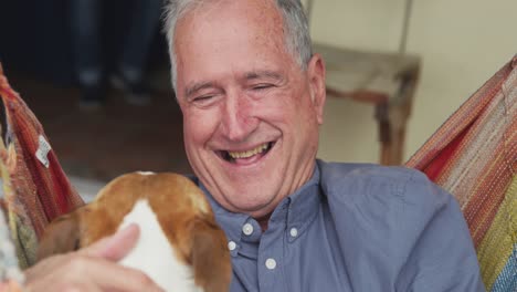 Senior-man-and-his-dog-at-home