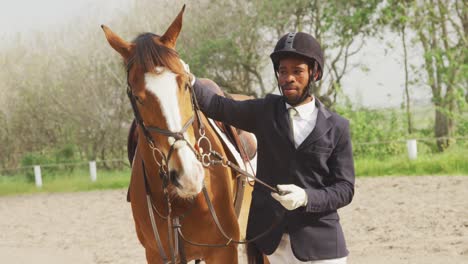 African-American-man-caressing-his-Dressage-horse