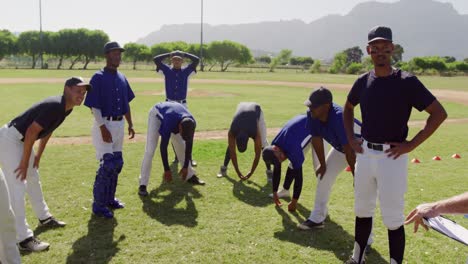 Baseball-players-stretching-before-playing