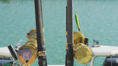 Closeup On Man Resting Hand On Trolling Fishing Rod, Rack Focus To  Caribbean Sea Free Stock Video Footage Download Clips